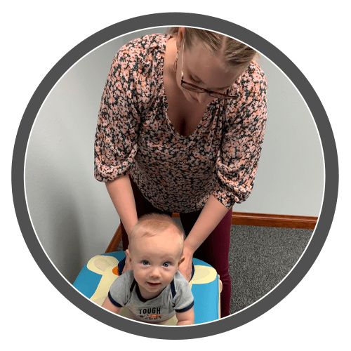 Chiropractor Rothschild WI Giana Backes Prepping Pediatric Adjustment